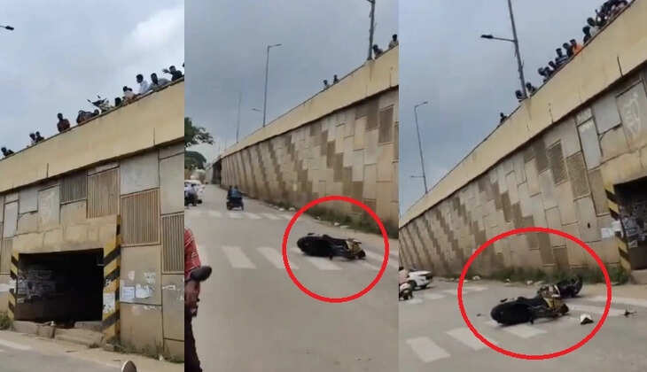 சாலையில் வீலிங் செய்த இளைஞரின் பைக்கை பாலத்தில் இருந்து கீழே தூக்கி போட்ட பொதுமக்கள்