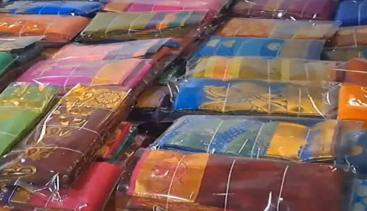 தி.மு.க நிர்வாகியின் ஜவுளிக்கடை கிடங்கில் 2,800 வேட்டி, சேலைகளை பறிமுதல்