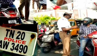 நம்பர் பிளேட்டில் ஸ்டிக்கர்