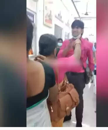 மனைவியை தாக்கிய கணவர்