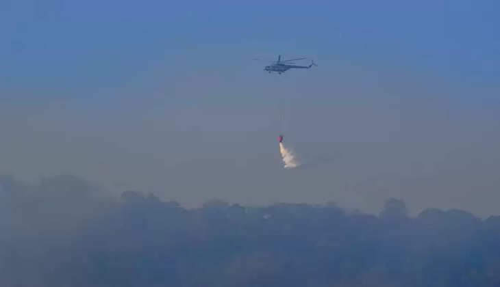 கோவை மேற்கு தொடர்ச்சி மலைப்பகுதியில் காட்டுத்தீ.. ஹெலிகாப்டர் உதவியுடன் தீயை அணைக்கும் பணி தீவிரம்.. 