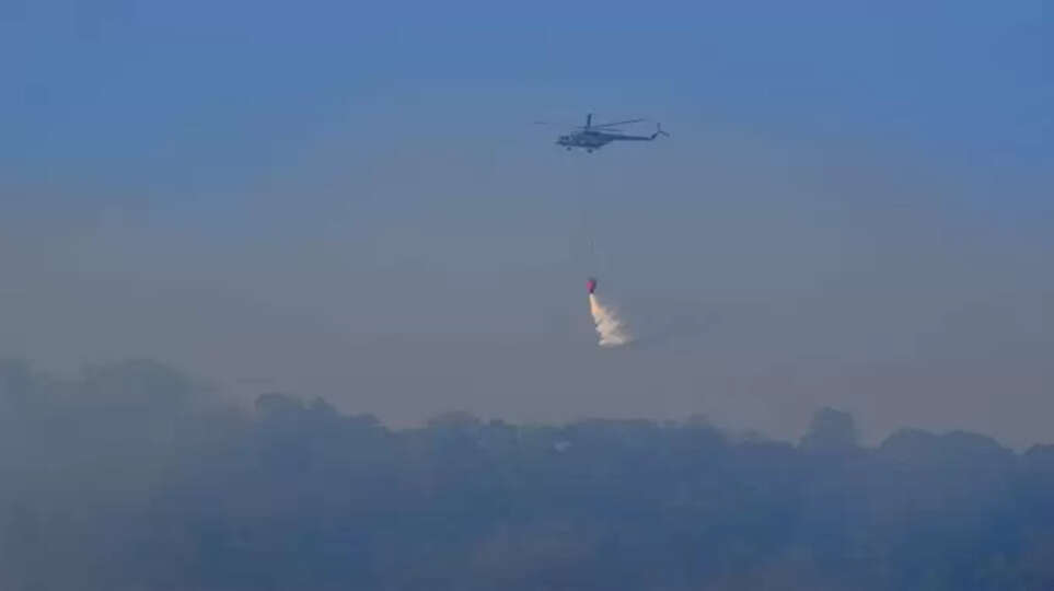 கோவை மேற்கு தொடர்ச்சி மலைப்பகுதியில் காட்டுத்தீ.. ஹெலிகாப்டர் உதவியுடன் தீயை அணைக்கும் பணி தீவிரம்.. 