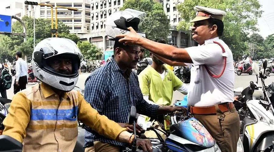 confiscate the two wheelers of those not wearing helmets