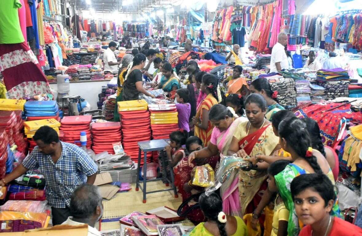 Retailers at the Erode textile market on the eve of the festival time