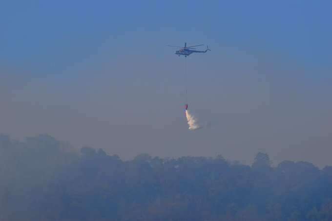 கோவை மேற்கு தொடர்ச்சி மலைப்பகுதியில் காட்டுத்தீ.. ஹெலிகாப்டர் உதவியுடன் தீயை அணைக்கும் பணி தீவிரம்..