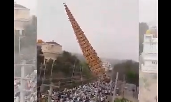 காற்றில் கவிழ்ந்த 100 அடி உயர தேர்- இருவர் பலி